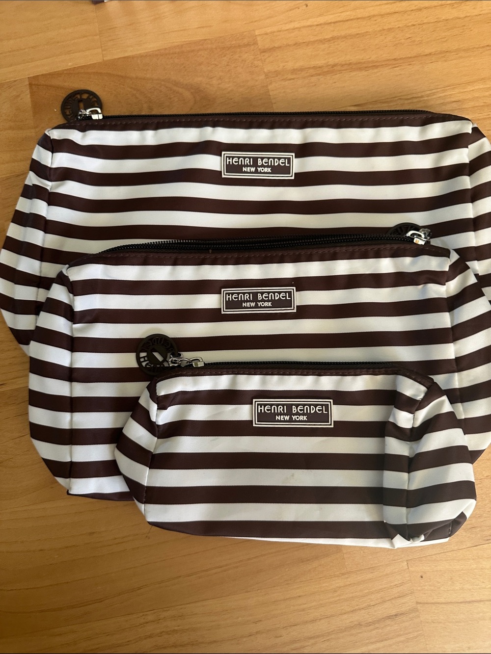 Henri. Bendel set of three striped nylon bags. - Picture 2 of 5